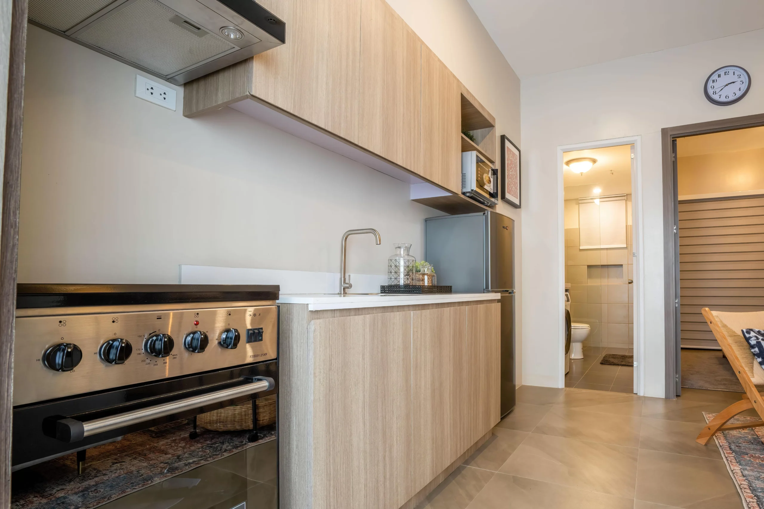 a kitchen with a stove and oven