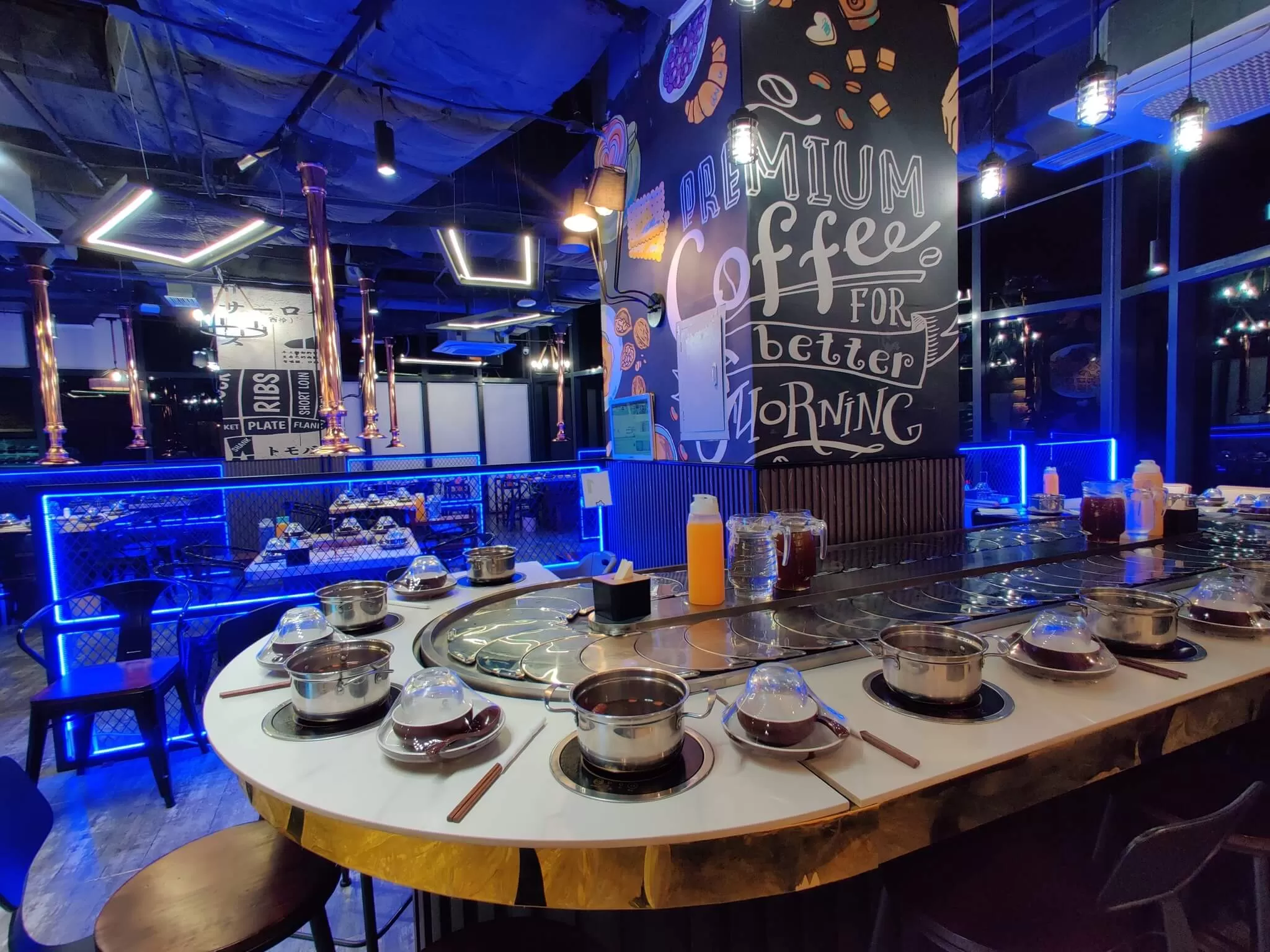 a table with pots and bowls on it