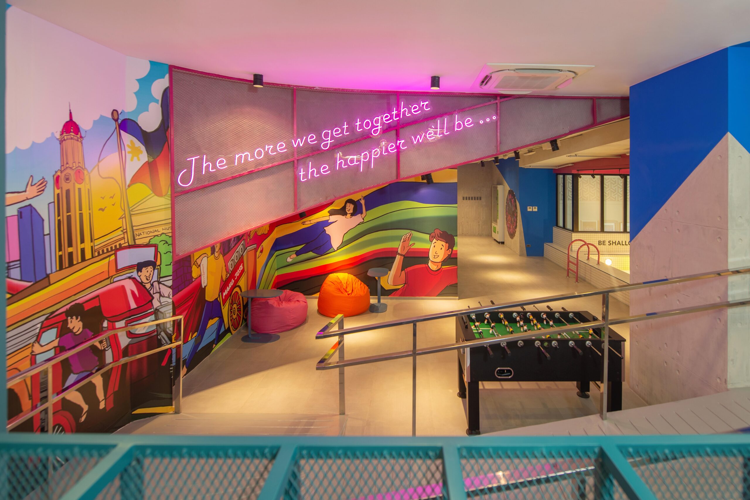 a social lounge in lyf Malate with a football table